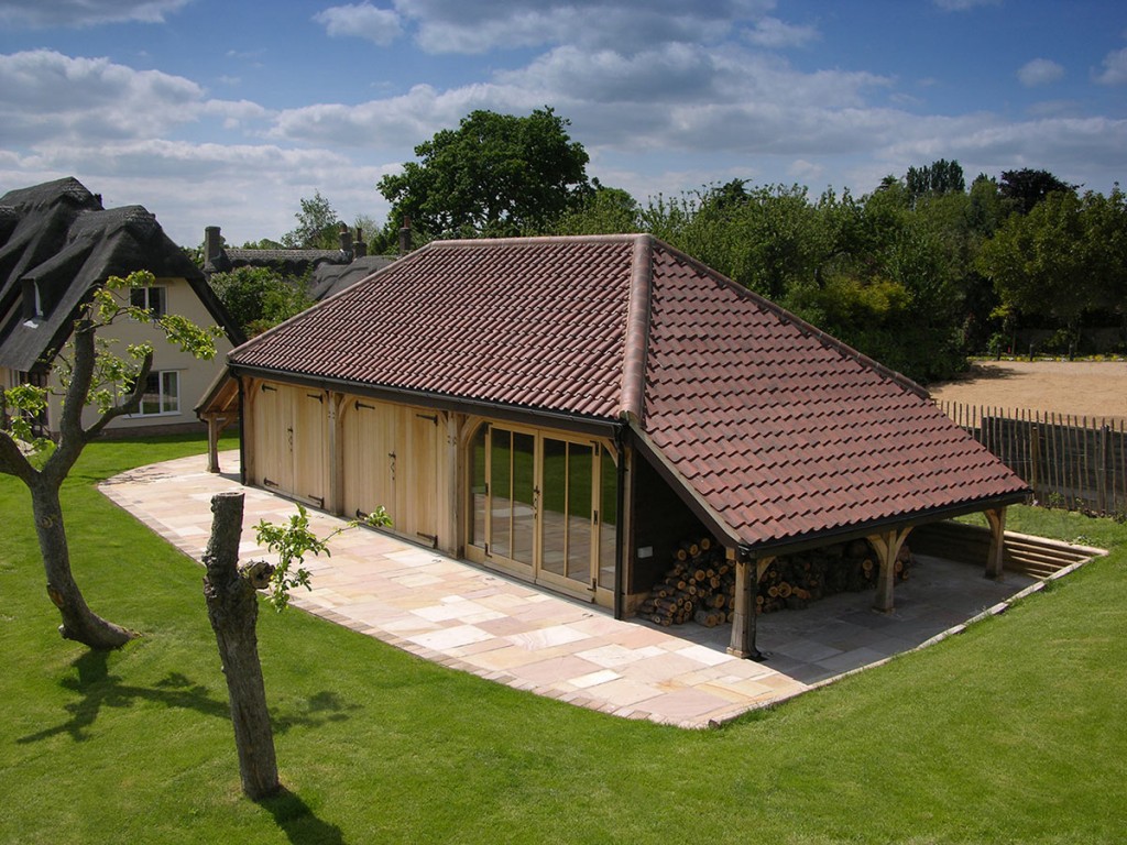 This SuperSize three-bay building boasts two full-length logstores, one at each end. One of the three bays has been converted for use as a gym (frame SS-E19).