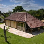 This SuperSize three-bay building boasts two full-length logstores, one at each end. One of the three bays has been converted for use as a gym (frame SS-E19).